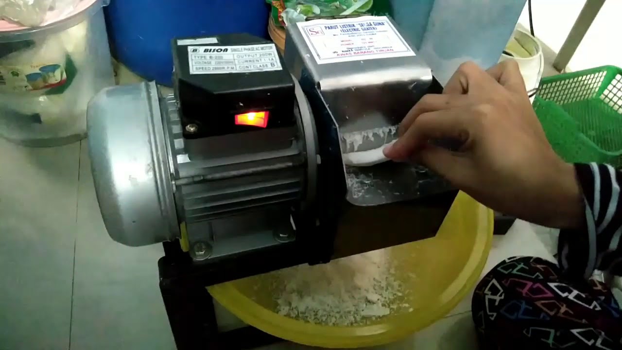 cara menggunakan mesin kelapa parut